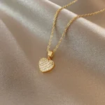 Gold necklace with shiny heart pendant ORPHA