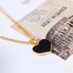 Gold necklace with black heart pendant AZALEA