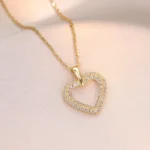 Gold necklace with openwork heart pendant MONA